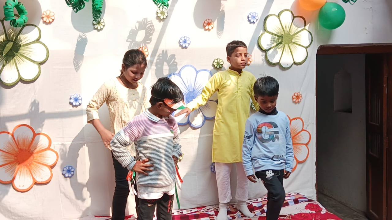 Students playing a blindfold game during the Independence Day celebration